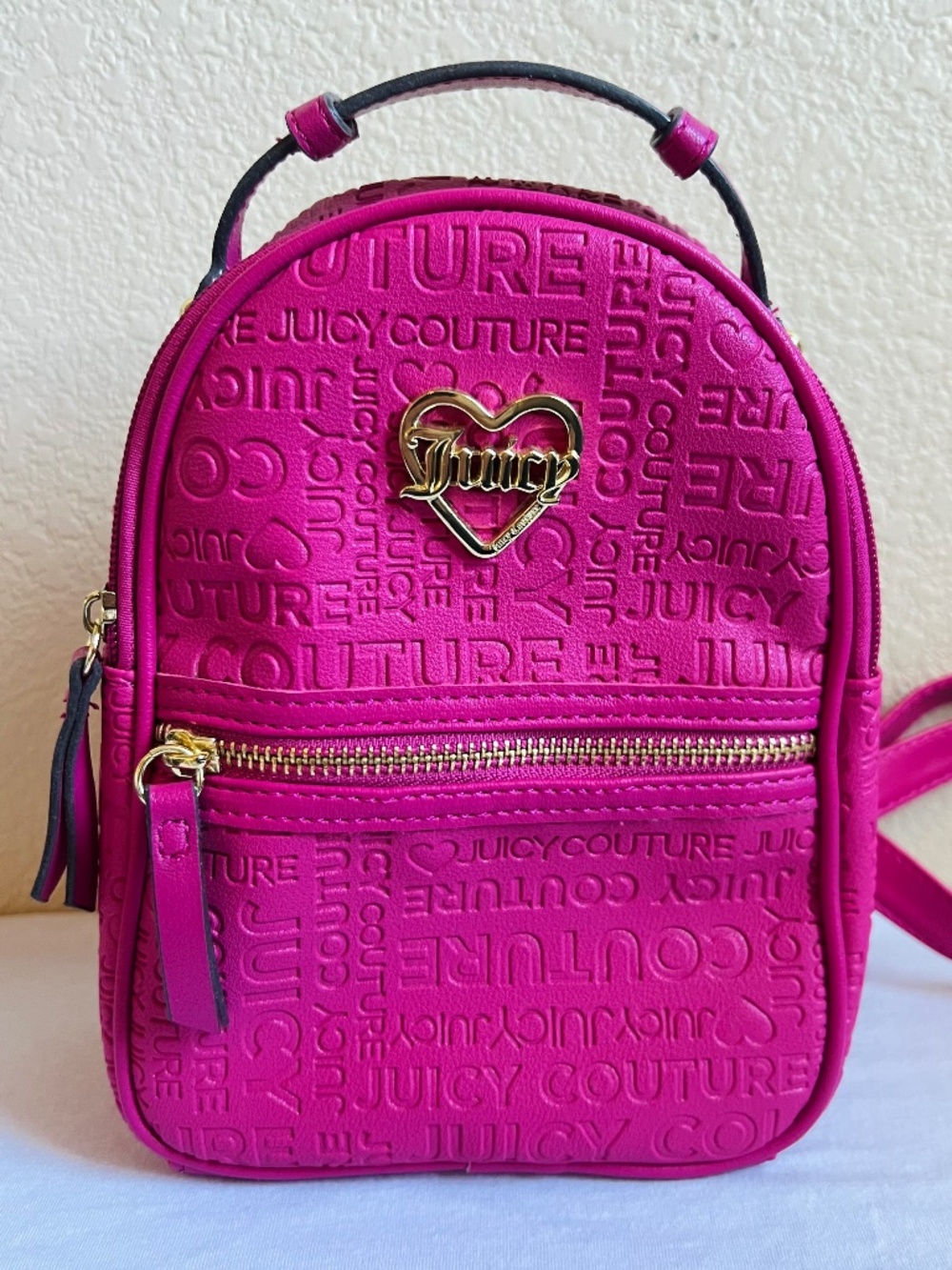 Juicy Couture Pre-Loved Small Raspberry Backpack with Gold Heart Emblem